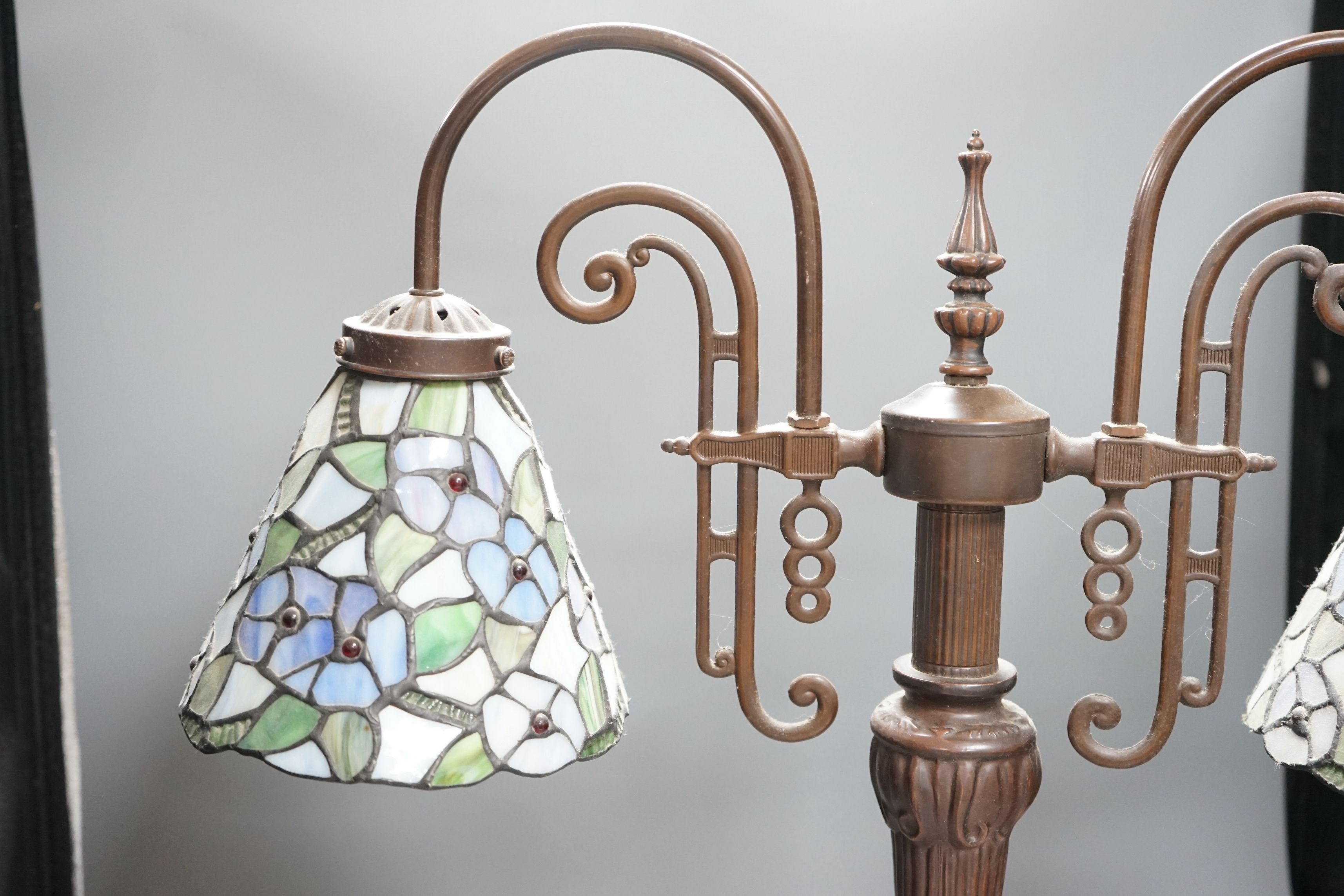 A Tiffany style two branch table lamp, 62cms high